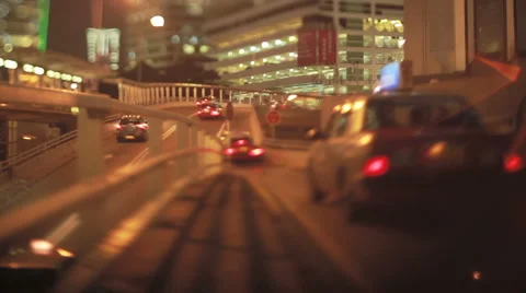 Tilt-shift lens view of night-time traffic in Hong Kong business district Stock Footage 57104130