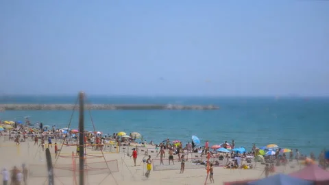 Tilt Shift Miniature Beach Fun Sports And Swimming Stock Footage 97830993