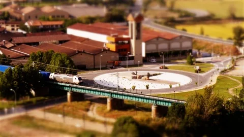 Tilt Shift: Miniature Train passing in Haro, La Rioja, Spain – view from above Stock Footage 98005265