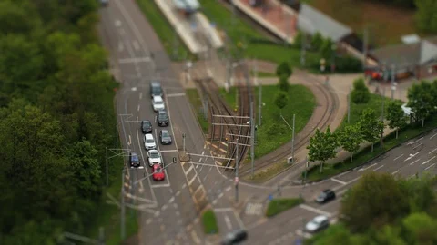 Tilt Shift Miniature Video of an intersection from above Stock Footage 126997978