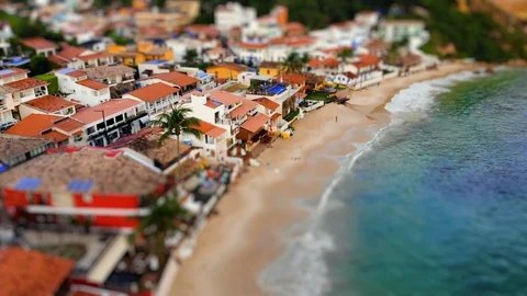Tilt shift of Morro de Sao Paulo village and beach. Bahia, Brazil. Aerial shot. Stock Footage 115886204