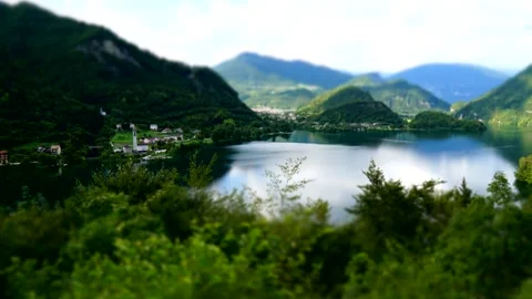 Tilt-shift time lapse of the Corlo Lake in the Belluno Dolomites Stock Footage 313956978