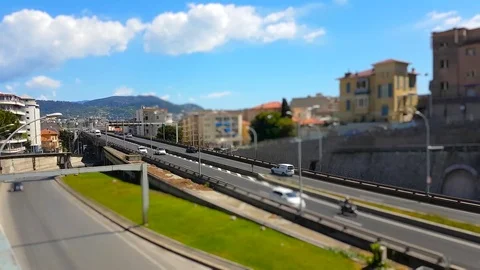 Tilt-Shift Time Lapse Of Highway Traffic On A Bridge in the City Center of .. Stock Footage 75678353