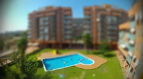 Tilt-Shift Time Lapse of Summer Resort Apartments Stock Footage 11867812