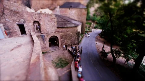 Tilt-shift: Tiny procession at Royal Monastery of San Juan de la Peña Stock Footage 98159549