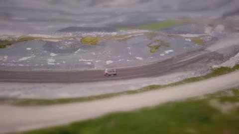 Tilt shit aerial view of a dump truck working at a quarry pit Stock Footage 135484025