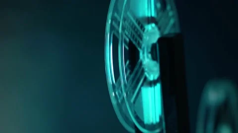 Tilt shooting of super 8 camera film projector, blue light Видео 148420359