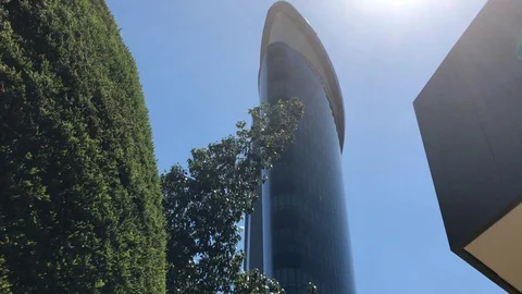 Tilt Shot Against the Sun of Skyscraper Building in Nicosia. Wargaming Building Stock Footage 101102787