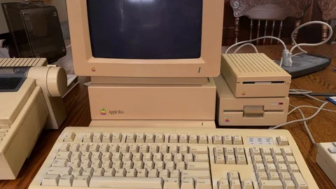 Tilt up shot of Apple IIGS computer, ancient technology, antiquated, Mac Stock Footage 123905361