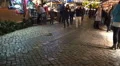Tilt shot Christmas fair with yellow christmas tree illumination HD Footage