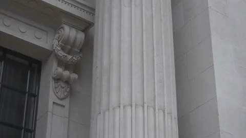 A tilt shot of the column of an old building. Stock Footage 132751718
