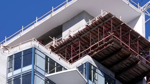 Tilt shot of construction of new high-rise building in city with 4k resolution Stock Footage 74289341