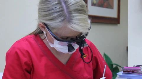 Tilt shot of dentist working Stock Footage 50809568