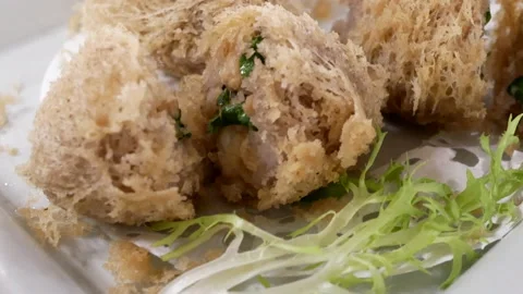 Tilt shot of dim sum on table inside Chinese restaurant Video stock 103082914