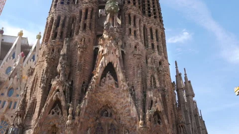 Tilt up shot of the eastern facade of the sagrada familia basilica Stock Footage 253249794