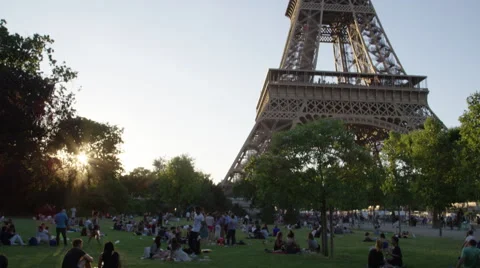 Tilt up shot of Eiffel Tower - Evening shot of Paris France's iconic monument Stock Footage 65311621
