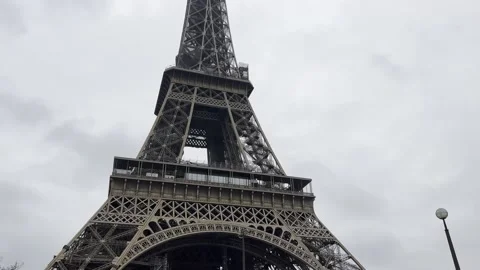 Tilt up shot Eiffel tower Paris with cloud in winter 4k Stock Footage 236108986