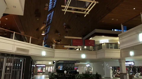 Tilt shot of empty shopping mall during coronavirus shutdown Stock Footage 130380583