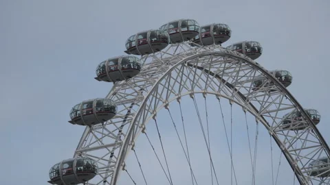 A tilt shot of a ferris wheel. Stock Footage 309155199