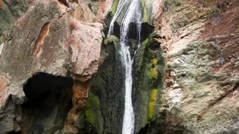 Tilt Shot of a Flowing Waterfall Stock Footage 219345381