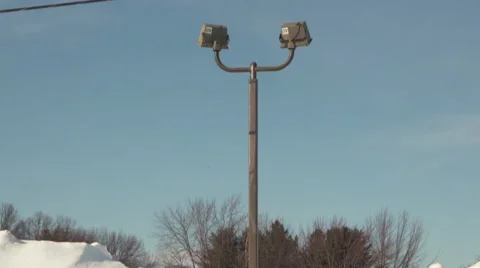 Tilt Shot of Light Post in High Snow Bank Video stock 47111684
