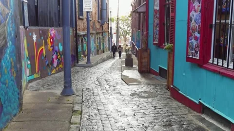 Tilt up shot of a passage in Cerro Alegre - Valparaiso, Chile - Jun 26, 2022 Stock Footage 199470101