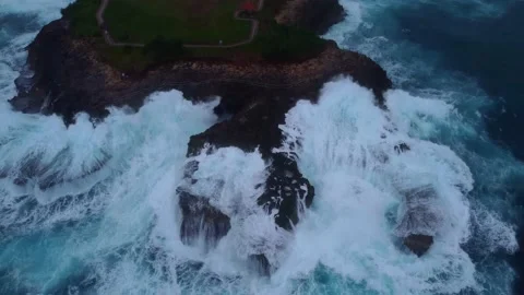 Tilt Shot: Storm at cliffs of Devils Tear (Bali) Stock Footage 200445335