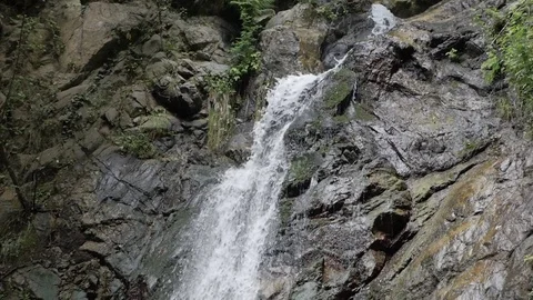 Tilt shot of waterfall - slow motion Stock Footage 75956664