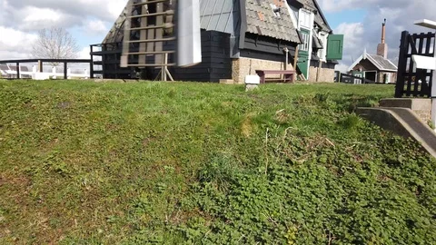 Tilt shot of a windmill at Kinderdijk Stock Footage 104779520