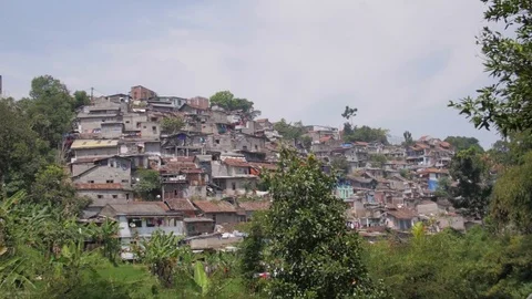 Tilt of slums on the hill Stock Footage 76554659