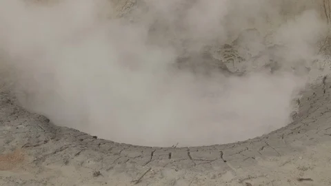 Tilt Up Steaming Hot Mud Pot Yellowstone National Park Stock Footage 122224260