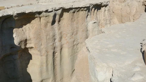 Tilt up strange looking rock formations of Valley of the Stars in Qeshm Iran Stock Footage 111666432