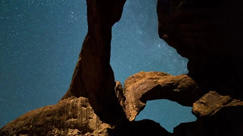 Tilt Up Time Lapse Scenic View Of Arches Against Starry Sky At Famous National Stock Footage 160314623