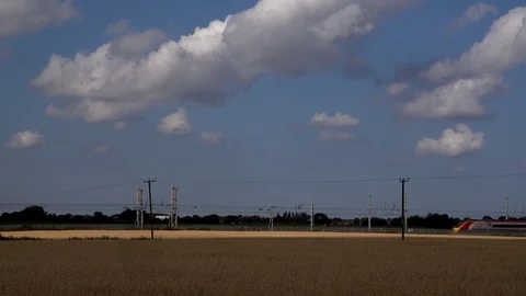 Tilt train Virgin moving through countryside England 4K Stockbeeldmateriaal 92606485