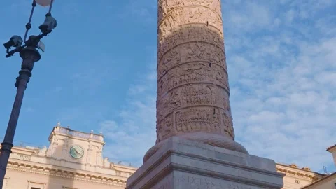 Tilt Up of Trajan's Column Reliefs Against Blue Sky in Rome Vídeo Stock 338071789