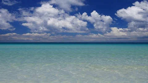 Tilt up UHD camera shot of the exotic turquoise water tropical seascape Stock-Footage 70040542