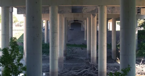Tilt up underneath overpass Stock Footage 89777250