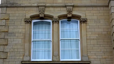 Tilt upwards old antique windows A Stock Footage 274092191