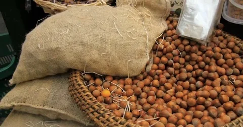 Tilt up view of a display of different variety of organic nuts Stock Footage 69242072