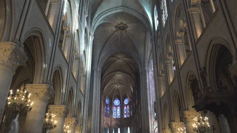 Tilt up view at the interior of Notre Dame Cathedral in Paris Stock Footage 263990541