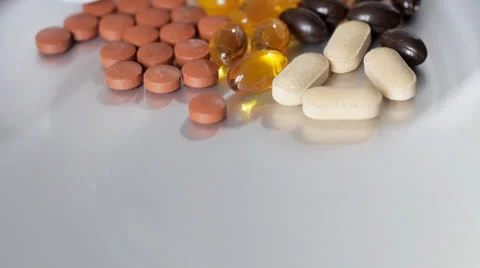 Tilt up to vitamin capsules Video stock 24844949