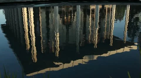 TILT UP WATER REFLECTIONS TO BUILDING Video stock 9105255