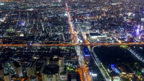 TiltDown Osaka City Night View Timelapse, High Angle Overview and Road Traffic Stock Footage 334557732
