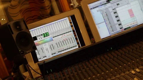 Tilted angle of monitors and sound desk in music recording studio Stock Footage 98722989