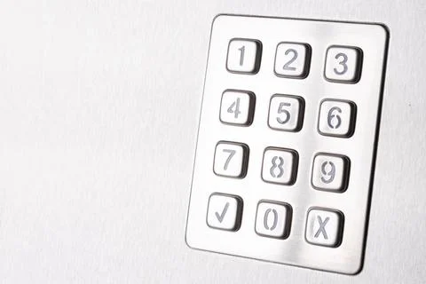 Tilted metallic numeric keypad panel Stock Photos