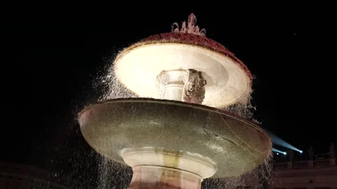 Tilted night st peter's square fountains water lighting airplane passing Stock Footage 320843846