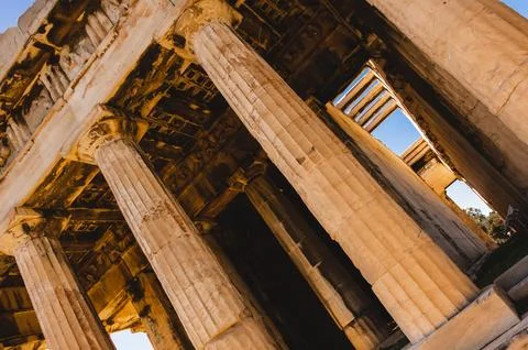 Tilted view of Doric columns in Temple of Hephaestus at Athens Agora, Greece. Stock Photos
