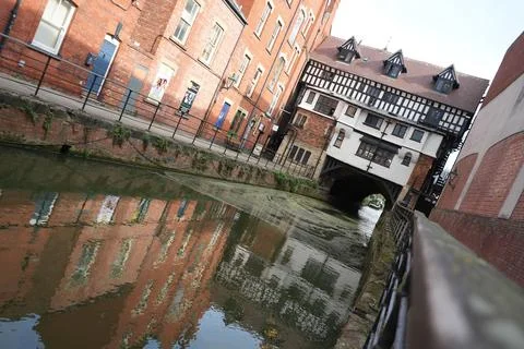Tilted view of River Witham reflections and High Bridge in Lincoln Stock Photos