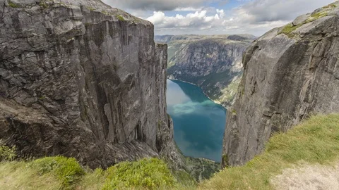 Tilting 4K Time-lapse of Norwegian Fjord with Cliffs and Clouds Near Kjerag Vídeo Stock 101015995