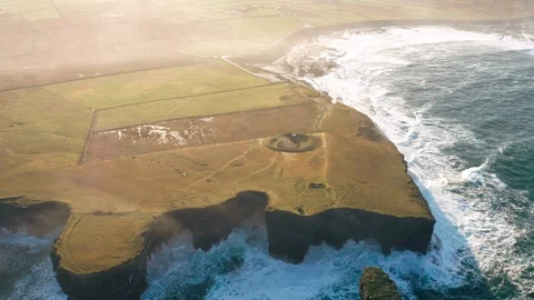Tilting Aerial Looking Over Downpatrick Head, Ireland Video stock 123445744